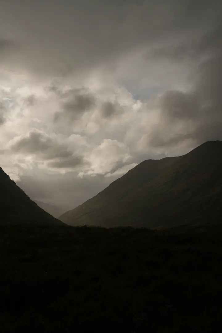 Hooded hiker on the Quiraing